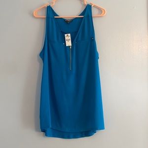 Gold zip front blue tank top